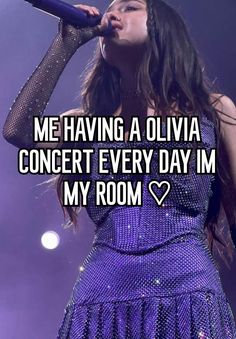 a woman singing into a microphone with the words me having a olvia concert every day in my room