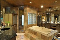 a large bathroom with an enormous jacuzzi tub