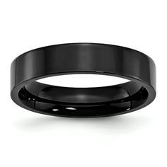 black ceramic wedding ring with polished finish inlayed to the center, on an isolated white background