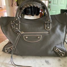 Balenciaga Grey City Bag Nwt. Silver Plaque Hardware. Bag Has Never Been Used. Purchased At Barney’s New York. 100% Authentic. Comes With Balenciaga Tags. Balenciaga Classic City, Balenciaga Wallet, Grey City, Bags Balenciaga, Barney’s New York, Silver Handbag, Dream Bags, Basket Tote, Balenciaga Logo