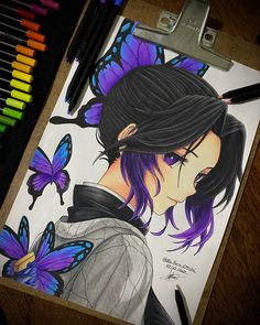 a drawing of a girl with purple hair and butterflies on her face, next to colored pencils