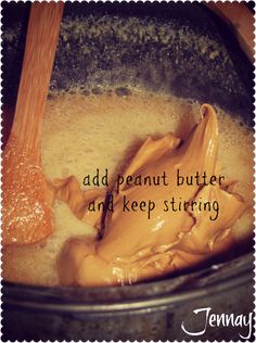 a wooden spoon stirring peanut butter in a crock pot with the words add peanut butter and keep stirring