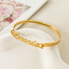 Custom Name Bracelet, Women Kids Name Cuff Bangle, Personalized Bangle, Nameplate Bracelet, Gold Name Bangle, Name Jewelry Gift,Gift For Her 💕------------------------------------------ Elevate your style with the Custom Name Bracelet, a stunning and sophisticated accessory that allows you to showcase your unique identity. Crafted with the utmost attention to detail, this bracelet features a sleek and modern design that can be personalized with your name, initials, or a special message. Whether Nameplate Bracelet, Single Pearl Necklace, Armband Gold, Nose Piercing Jewelry, Bamboo Earrings, Titanium Earrings, Dainty Gold Necklace, Gold Pearl Earrings, Bracelet Women