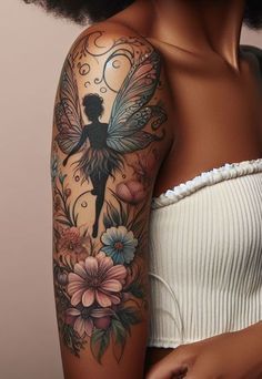 a woman with a tattoo on her arm