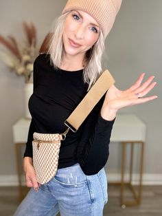 Meet the Westlyn Woven Bum Bag! Gorgeous woven vegan leather in checkered tan with a unique block design on the strap gives it an edgy, rocker vibe too. Beautiful hardware with a zipper closure with beige and black chevron interior, and a zippered slash pocket on the inside. This crossbody bag is the perfect accessory to elevate any outfit all year! Details crossbody bum bags woven look checkered tan vegan leather 12"L x 8"H x 24" 46" removable strap soft feel Trendy Fall Belt Bag With Adjustable Strap, Trendy Beige Belt Bag With Zipper Closure, Trendy Beige Belt Bag, Suede Jewelry, Nickel And Suede, Bum Bags, Beauty Gift Card, Slash Pocket, Black Chevron