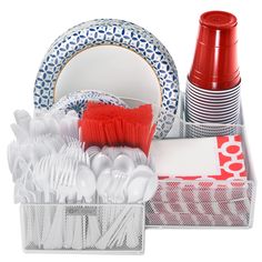 an assortment of dishes and utensils are arranged in a plastic container on a white background