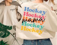 Are you looking for Custom Hockey Mama Sweatshirt? We got you! ✅ ABOUT OUR  Hockey Mom Hoodie Crewneck ▸  These garments are made from polyester and cotton.  ▸ The collar is ribbed knit, so it retains its shape even after washing.  ▸ There are no itchy side seams on these sweaters. ▸Printed and shipped from the USA ▸ Shipped in a safe package to ensure it arrives perfect. GUARANTEED. ✅ HOW TO ORDER your Sweatshirt for Mom 1. Check our photos for sizing and color options. 📏 2. Choose your quanti Game Day Sweatshirt, Hockey Hoodie, Hockey Sweatshirts, Hoodie Personalized, Mom Hoodies, Hockey Mom, Mama Sweatshirt, Mom Sweatshirt, Game Day