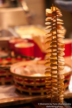 a wooden table topped with lots of food