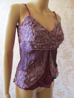 "Vintage lacy top, boho style. This lovely top is a purple scrunch fabric with a lace overlay with embroidered flower pattern and sequins. It has a V neck and bra straps. Bust;  32\"  it has some stretch Length;  21\" Made by NEXT" Fitted Cami Top With Lace Patchwork, Lace Patchwork Camisole Top For Party, Party Lace Trim Cami Top, Summer Evening Lace Top Camisole, Spring Lace Bodice Cami Top, Party Tops With Lace Patchwork And Spaghetti Straps, Party Tops With Spaghetti Straps And Lace Patchwork, Spring Cami Top With Lace Bodice, Summer Sleeveless Top With Lace Bodice