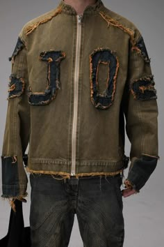 The Distressed Military-Style Jacket with Appliqué features a rugged, vintage-inspired design with distressed detailing and unique appliqué patches, adding character and edge to your outerwear collection. Made from durable, high-quality fabric, this jacket ensures longevity and comfort. Its military-style cut includes functional elements such as multiple pockets and a button-front closure, perfect for both style and practicality. Versatile enough to be paired with jeans, trousers, or skirts, thi Urban Cotton Outerwear With Embroidered Patch, Urban Outerwear With Embroidered Patch For Fall, Vintage Distressed Outerwear For Fall, Fall Cotton Outerwear With Embroidered Patch, Fall Long Sleeve Outerwear With Collage Stitching, Punk Long Sleeve Outerwear With Patches, Distressed Long Sleeve Grunge Outerwear, Distressed Long Sleeve Outerwear In Grunge Style, Punk Style Long-sleeve Outerwear With Patches