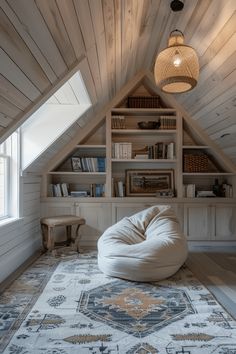 a white bean bag chair sitting on top of a rug in front of a window