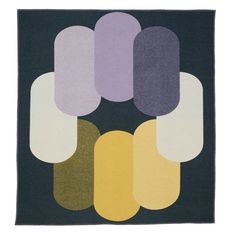 a rug with different colored shapes on it