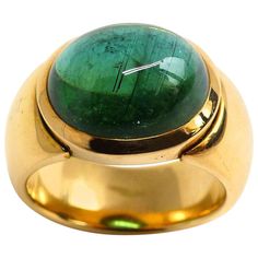 Thomas Leyser is renowned for his contemporary jewellery designs utilizing fine gemstones. This 18k rose gold ring (19.53g) is set with 1x fine Green Tourmaline Cabouchon (oval, 13.5x11mm, 8.06cts). Ringsize: 6 1/2 (53.5). Fork Jewelry, Gemstone Rings Vintage, Green Tourmaline Ring, Contemporary Jewelry Design, Diamond Jewelry Necklace, Necklace Diamond, Cabochon Ring, 18k Gold Ring, Modern Ring