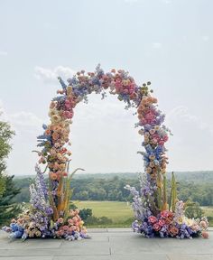 Pastel Flower Decorations, Soft Rainbow Wedding, Rainbow Pastel Wedding Theme, Wedding Summer Flowers, Spring Wedding Backdrop, Neutral Theme Wedding, Rainbow Flower Wedding, Muted Rainbow Wedding, Wedding Decorations Summer