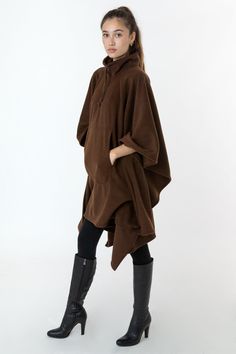 This Unisex Poncho is made of our insulating, cozy Polar Fleece and features a front kangaroo-style pocket and half zip neckline with an adjustable drawcord at the neck to ensure extra warmth. Layer with a turtleneck and our winter leggings for a simple and functional winter look. Also the perfect piece to wear around the house when its too cold to even leave. Made in South Central, Los Angeles by experienced workers earning fair wages. | Polar Fleece Half Zip Poncho for Women in Brown Cozy Solid Funnel Neck Outerwear, Cozy Solid Color Funnel Neck Outerwear, Solid Outerwear With Kangaroo Pocket For Loungewear, Solid Color Outerwear With Kangaroo Pocket For Loungewear, Fleece Outerwear With Kangaroo Pocket For Fall, Fall Fleece Outerwear With Kangaroo Pocket, Hooded Poncho With Pockets For Fall, Hooded Fall Poncho With Pockets, Brown Outerwear With Kangaroo Pocket For Outdoor