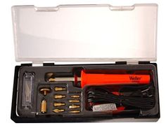 an orange and black tool set in a plastic case