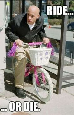 a man riding a pink bike next to a parking meter with the caption ride or die