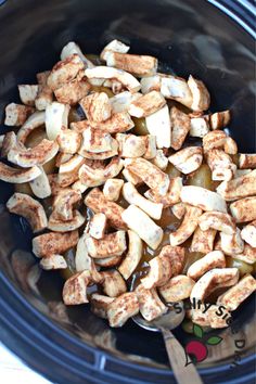 the food is being cooked in the slow cooker