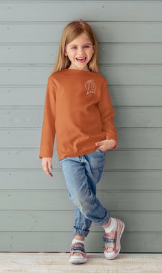 The Cute Fall Sweatshirt for Girl is a perfect Pumpkin Sweatshirt for Young Girl, making an ideal Birthday Gift for Her for Autumn. This Lightweight Soft Crewneck Long Sleeve Tee combines comfort and style, ensuring she stays cozy and fashionable throughout the season. The Sport-Tek Competitor tee bears all the marks of comfort and style. Made 100% with the signature polyester blend that features PosiCharge ® technology, this tee is lightweight, breathable, and moisture wicking. Discover the per Long Sleeve Tops With Graphic Print For Birthday, Graphic Print Tops For Birthday In Fall, Fall Birthday Crew Neck Tops, Casual Tops For Fall Birthday, Cute Fall Birthday Tops, Pumpkin Sweatshirt, Pumpkin Sweatshirts, Birthday Gift For Her, Fall Sweatshirt