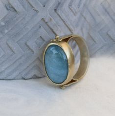 "A unique piece of gemstone ring made elegant with a natural Aquamarine stone, set in bezel of 14k yellow gold fill. A gold ring that has a touch of both classic and modern style. A 14k ring that will suit for everyday use and easy to incorporate into your casual, formal and boho looks. Wear and style with other stackable rings for women and create your own jewelry combinations. Product Details: --------------------- Ring Size: Please select from the drop-down menu. Ring width: 0.19\"/ 4.7mm Sto Jewelry Combinations, Gold Rings For Women, Rings Oval, March Birthstone Ring, Oval Engagement Ring, Oval Engagement, Aquamarine Ring, Gold Filled Ring, March Birthstone