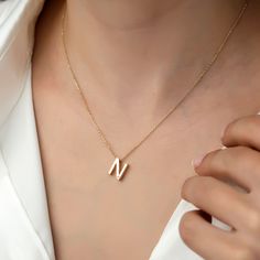 14k Gold Minimal N Letter Necklace, Letter Necklace, Gold Necklaces, 14k Gold Necklace, Necklace for Love, Necklace for Name ITEM DETAILS ❆ All our jewelleries are handmade with Love and Care 💓 ❆ Material: 14K Gold. ❆ Gram: 2,00 gr ❆ Each item is made to order. Since all of our products are handmade, there may be -) 10% deviation in the specified weight. ❆ DO YOU LIKE THIS RING? You can get more information about it below but if you have any questions, just send a message. PACKAGING ❆ They are Necklace With Letter, Letter Necklace Gold, N Letter, Letter N, 14k Gold Necklace, Gold Necklaces, Gold Piece, Cute Rings, Letter Necklace