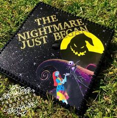 a graduation cap with the words, the nightmare just begun and an image of a cartoon character on it