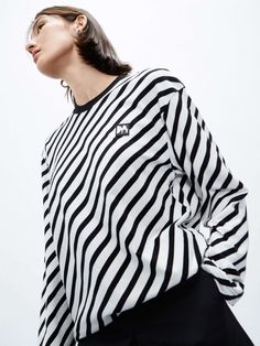 MO&Co. Women's Long Sleeve Striped T-shirt Crafted from pure cotton, this relaxed T-shirt features a round neck, dropped shoulders and long sleeves. The diagonal stripes are classic and versatile. Features : - Classic diagonal stripes- M embellishment at front- Drop shoulders, long sleeves- Loose fit Code: MBC3TEET03The back length of size S is 66.5cmMATERIALS & CARE Material: 100% CottonPlease do not iron decorative parts.REMINDER: All items are measured manually. Please note that it's reasonab Stripe Shirts, Striped Shirt Women, Tshirt Crafts, Diagonal Stripes, Striped T Shirt, Color Stripes, Striped Shirt, Drop Shoulder, Women Long Sleeve