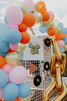 an image of balloons and vinyl records on display