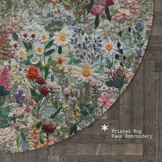 an image of a patchwork quilt with flowers on the front and back side, printed rug by faux embroidery