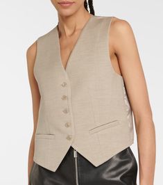 Elegant Wool Vest For Office, Elegant Beige Vest For Work, Elegant Beige Notch Lapel Vest, Elegant Beige Vest With Notch Lapel, Chic Tailored Wool Vest, Elegant Tailored Vest For Work, Tailored Elegant Office Vest, Tailored Elegant Vest For Work, Wool Vest With Notch Lapel For Work