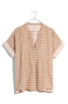 With its flowy fit and laid-back vibe, this double-faced popover top is made for sunnier days (it comes in lightweight cotton). Easy banded sleeves and side slits make it just so breezy. Split neck Short sleeves 100% cotton Machine wash, tumble dry Imported Cotton V-neck Top With Rolled Sleeves, Effortless Cotton Tops With Rolled Sleeves, Cotton Tops For Warm Weather, Effortless Cotton Summer Shirt, Summer Vacation Tops With Rolled Sleeves, Rolled Sleeves Summer Vacation Tops, Effortless Cotton Shirt For Summer, Relaxed Fit Top With Rolled Sleeves For Summer, Relaxed Tops With Rolled Sleeves For Spring