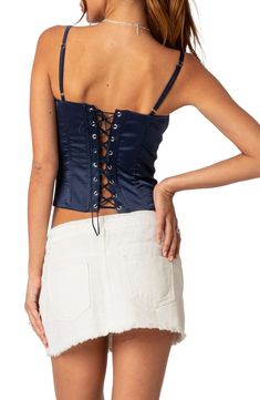 This corset-inspired top is designed from lustrous satin with colorblocking at the bust, waist-cinching boning and a laced-up back. Square neck Adjustable straps 95% polyester, 5% spandex Machine wash, dry flat Imported Sleeveless Satin Tops With Corset Back, Satin Corset Belt With Boned Bodice, Satin Tops With Boned Bodice For Night Out, Satin Crop Top With Boned Bodice, Satin Underbust Corset With Adjustable Straps, Satin Underbust Corset With Straps, Underbust Satin Corset With Adjustable Straps, Underbust Satin Corset With Straps, Satin Overbust Corset With Adjustable Straps