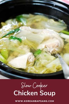 slow cooker chicken soup in a black bowl