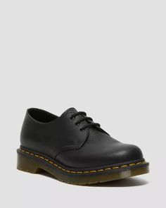 1461 Women's Virginia Leather Oxford Shoes in Black | Dr. Martens Casual Closed Toe Oxfords With Leather Lining, Vintage Leather Oxfords With Leather Footbed, Casual Leather-lined Closed Toe Oxfords, Casual Oxfords With Leather Lining, Vintage Leather Lace-up Shoes With Leather Footbed, Casual Closed Toe Leather Shoes For Derby, Casual Leather Shoes With Closed Toe For Derby, Casual Leather Shoes With Rubber Heel Cap, Casual Leather Shoes With Leather Footbed For Derby