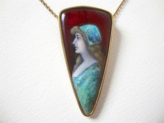 "Beautiful antique Antoine Soustre Limoges enamel pendant with a portrait of a lady framed in 18K gold on a 14K gold chain necklace. The rim of the pendant is hallmarked with the French Eagle for 18K gold and the back of the pendant signed Soustre Limoges. The necklace is marked 14K. The necklace weighs 9.3 grams. The pendant measures 1 11/16\" in length, 7/8\" at the top in width tapering to about 3/16\" at the bottom. The necklace is 15 5/8\" in length. There are some minor surface scratches a Elegant Enamel Cameo Jewelry, Gold Enamel Necklace With Cabochon, Gold Enamel Necklaces With Cabochon, Art Nouveau Gold Enamel Jewelry, Gold Enamel Art Nouveau Jewelry, A Lady, Gold Chain Necklace, Gold Chain, Gold Chains