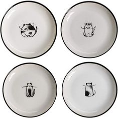 four black and white plates with cats drawn on the front, one has a cat's head