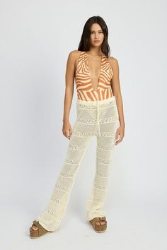 Step into a world of bohemian elegance with our exquisite Crochet Beach Pants. Imagine strolling along sun-kissed shores, feeling the gentle sea breeze caress your skin as you exude effortless style. These enchanting pants are more than just beachwear; they're a statement of free-spirited confidence. The intricate crochet detailing tells a story of artisanal craftsmanship, while the flowy silhouette promises comfort and versatility. Whether you're lounging by the pool or sipping cocktails at a b White Summer Pants, Crochet Beach Pants, Pants Crochet, Crochet Pants, Beaded Belt, Crochet Skirt, Summer Pants, Beach Pants, Loafer Mules