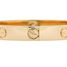 This is an authentic CARTIER 18K Yellow Gold LOVE Bracelet size 16. The bracelet is crafted of 18 karat yellow gold and features the signature engraved LOVE screw motifs throughout the bangle. The bracelet also features the Cartier screw system that prevents the loss of the screws when opening the bangle. Gold Love Bracelet, Love Bracelet, Love Bracelets, Bracelet Sizes, Cartier, Screw, Size 16, Bangles, Yellow Gold