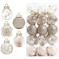 christmas ornaments in clear boxes with gold trimmings and white bauble decorations