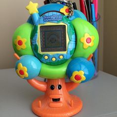 an electronic toy on top of a desk