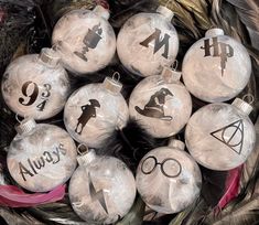 harry potter christmas ornaments on display in a basket