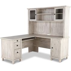 the corner desk has two drawers and a hutch