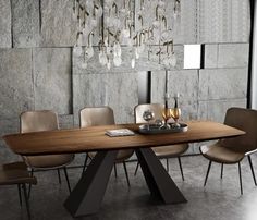 a dining room table with chairs and a chandelier