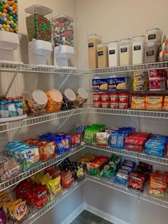 a pantry filled with lots of different types of food and containers on the shelves next to each other