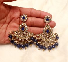 Indian Semi Bridal Drop Necklace Earrings & Tikka Set Beautiful & Light in weight. Necklace width : 1.9 inches (with drops) Earrings length: 2.8 inches (with drops) Width: 2 inches Blue Traditional Earrings For Reception, Traditional Blue Earrings For Reception, Blue Kundan Earrings For Celebration, Blue Kundan Traditional Bridal Earrings, Blue Kundan Earrings For Party, Blue Kundan Bridal Earrings For Wedding, Traditional Blue Kundan Bridal Earrings, Traditional Blue Chandbali Bridal Earrings, Blue Bollywood Bridal Earrings For Festivals