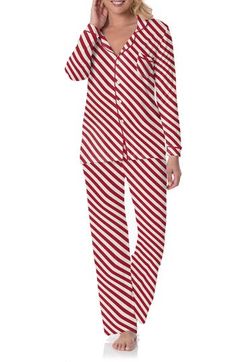 Made without tags for distraction-free comfort, you'll feel comfy whenever you slip into these pajamas made from festively striped, supersoft jersey with plenty of stretch. KicKee Pants' signature fabric even has built-in sun protection, so you can wear them out for an extra-long dog walk if you feel like it. Top has front button closure; notched collar; long sleeves; chest patch pocket Bottoms have elastic/drawstring waist UPF 50+ sun protection 95% viscose, 5% spandex Machine wash, tumble dry Long Dog, Dog Walk, Kickee Pants, Striped Pyjamas, Notched Collar, Sleepwear Women, Upf 50, Candy Cane, Extra Long