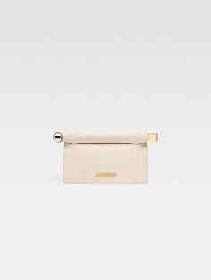 LA PETITE POCHETTE ROND C Designer Evening Pouch With Detachable Handle, Modern Beige Clutch For Evening, Designer Beige Evening Clutch, Designer Beige Clutch For Evening, Chic Evening Pouch With Top Handle, Designer Evening Clutch Pouch, Top Handle Clutch With Removable Pouch For Events, Designer Clutch With Magnetic Closure And Top Handle, Designer Clutch With Top Handle And Magnetic Closure