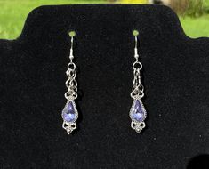 Beautiful authentic amethyst gemstone earrings. Unique vintage style of plating around the gems. Looks gorgeous in the sunlight! Vintage Amethyst Purple Earrings, Purple Jeweled Earrings As Gift, Purple Jeweled Earrings For Gift, Purple Jeweled Dangle Earrings, Purple Jeweled Drop Earrings, Tear Drop Earrings, Earrings Unique, Saint Charles, Amethyst Gemstone