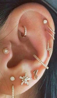 three different types of ear piercings