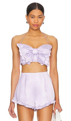 Find MAJORELLE Siren Top In Lavender on Editorialist. MAJORELLE Siren Top in Lavender. - size M (also in S, XS) MAJORELLE Siren Top in Lavender. - size M (also in S, XS) Unveiling the MAJORELLE Siren Top in a dreamy Powder Purple shade. This satin crop top is designed for playful charm, featuring a flattering halterneck styling. Paired with matching shorts, it creates a cohesive and girly ensemble that's perfect for embracing the warm weather.. 97% polyester 3% elastane. Made in China. Hand wash Siren Top, Satin Crop Top, Romantic Escapes, Cami Tanks, Satin Fabric, Elegant Dresses, Warm Weather, The Dreamers, Lavender